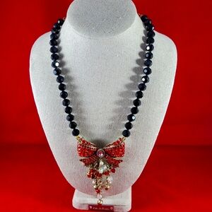 RETIRED HEIDI DAUS BRONZ COLECTION    NECKLACE, NEVER BEN USED. 18" LONG